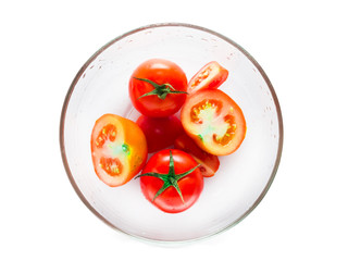 tomato in bowl isolated on white