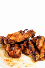 Grilled chicken wings isolated on white background
