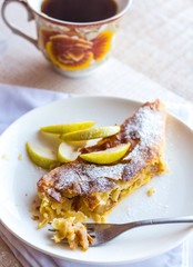 dessert apple strudel on a  plate, fork, process to eat