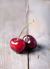 Fresh cherry on a wooden background