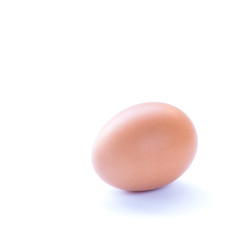 Close up of an egg isolated on white background