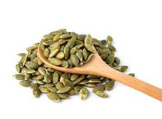Pumpkin seeds on a white background