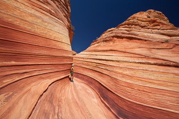 USA - girl in the Coyote buttes recreational park - The wave