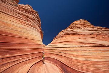 USA - girl in the Coyote buttes recreational park - The wave