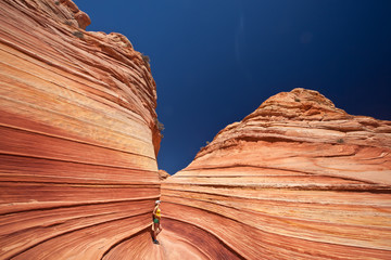 USA - girl in the Coyote buttes recreational park - The wave