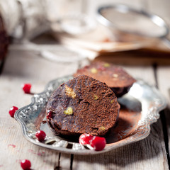 Chocolate dessert salami with cranberries