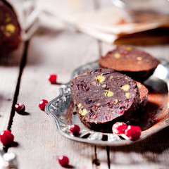 Chocolate dessert salami with cranberries