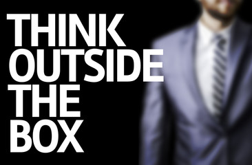 Think Outside The Box written on a board