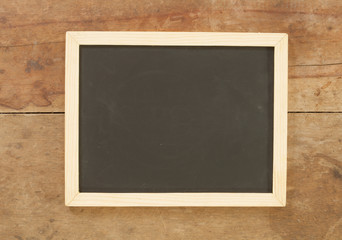 blackboard on wooden background