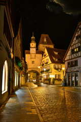 Night illuminated view of old German town  Rotenburg on Tauber.