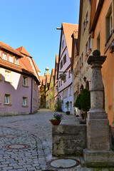 Fototapeta premium Street of town Rotenburg on Tauber in Germany. Facades of the ho