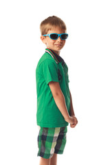 Little smiling boy with sunglasses isolated on white