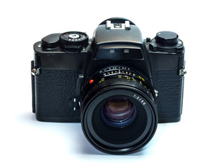 Classic film camera with normal lens isolation on white