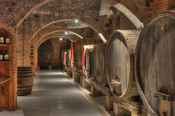 Cellar with barrels of wine