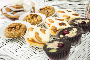 Dessert table for a party.  Cake, cupcakes, sweetness