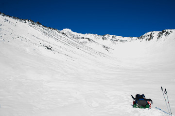 Winter landscape in the mountains with blue sky in the clouds