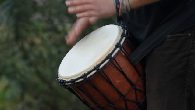 Musician playing on the drum