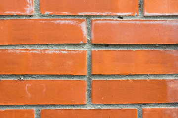 Obraz premium Background of red brick with cement