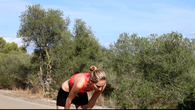 young athletic woman runner running outdoor nature summer joggin
