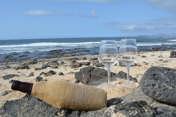 Celebration With Two Glases Of  Red Wine On The Beach