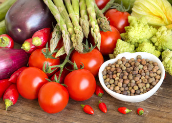Raw organic roveja beans and vegetables