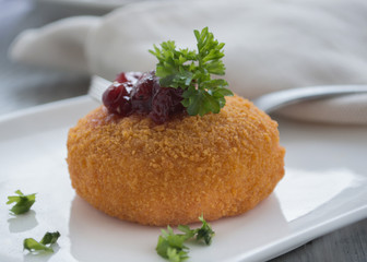 Baked camembert with stewed cranberries on top