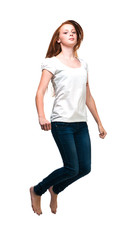 Fototapeta premium Jumping girl in a white T-shirt. Isolated on white background