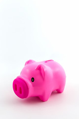 Pink piggy bank saving .