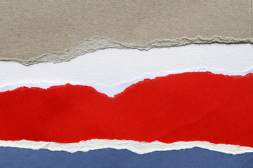 Ripped brown red blue papers