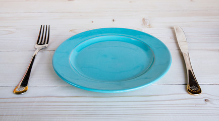 teapot and cup on a wooden tray