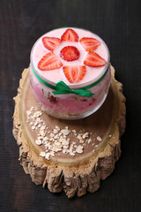 Healthy breakfast - yogurt with  strawberries and muesli served