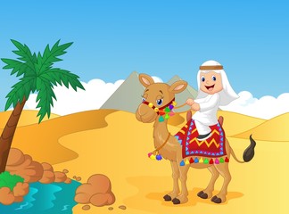 Arab boy riding camel