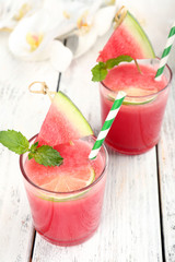 Watermelon cocktail on table, close-up
