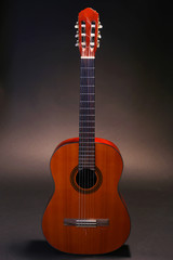 Naklejka premium Guitar on dark background