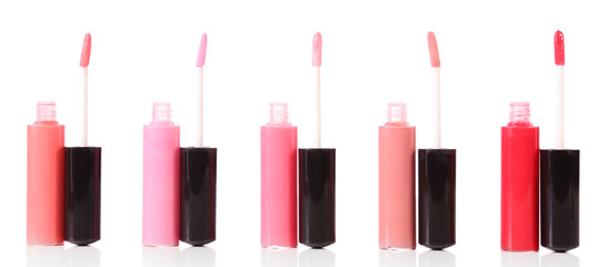 Obraz premium Beautiful lip glosses, isolated on white