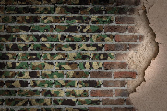 Dark brick wall with plaster - Army camouflage