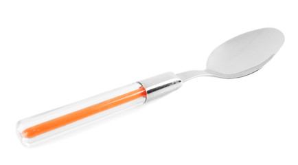 Metal spoon with color plastic handle isolated on white