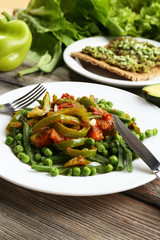 Healthy salad with peas and asparagus served