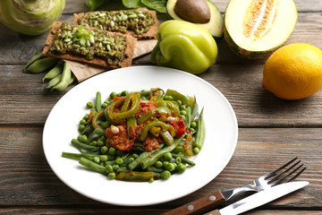 Healthy salad with peas and asparagus served