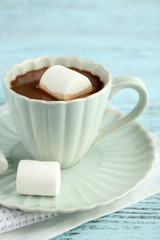 Hot chocolate with marshmallows in mug,