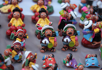 Fototapeta na wymiar Miniature funny figures of Bolivian people, La Paz, Bolivia