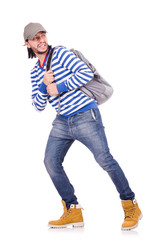 Fototapeta premium Student with backpack isolated on the white