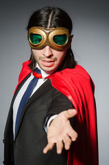 Obraz premium Superman concept with man in red cover