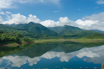 Fototapeta premium Mountains and water in the dam