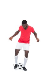 Full length of football player playing