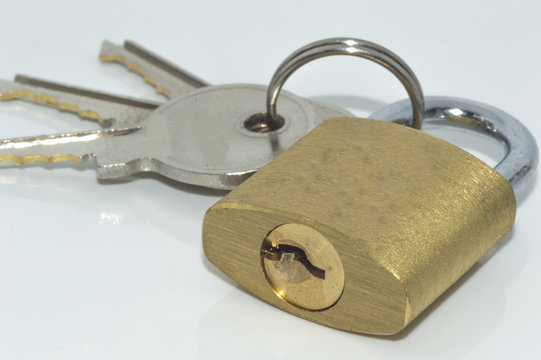 Padlock and key with white background