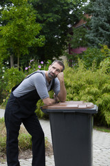 Fototapeta premium man with trashcan