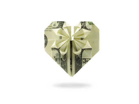 origami heart of hundred dollar banknote