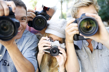Group of paparazzi people taking picture
