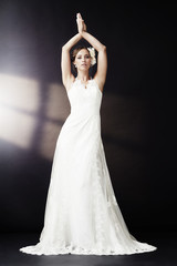 Fototapeta premium Elegant bride in wedding dress posing, portrait.